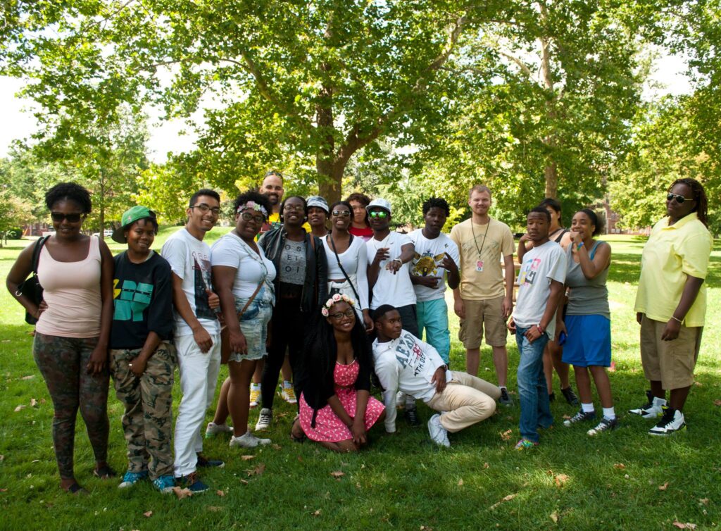 Members of Detroit REPRESENT! standing together in a park