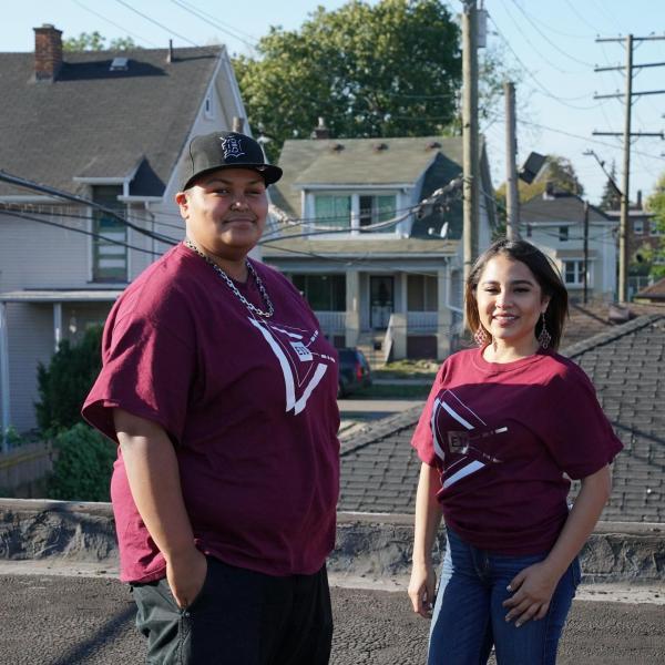 Two EII Digital Stewards from Southwest Detroit standing on a commercial rooftop